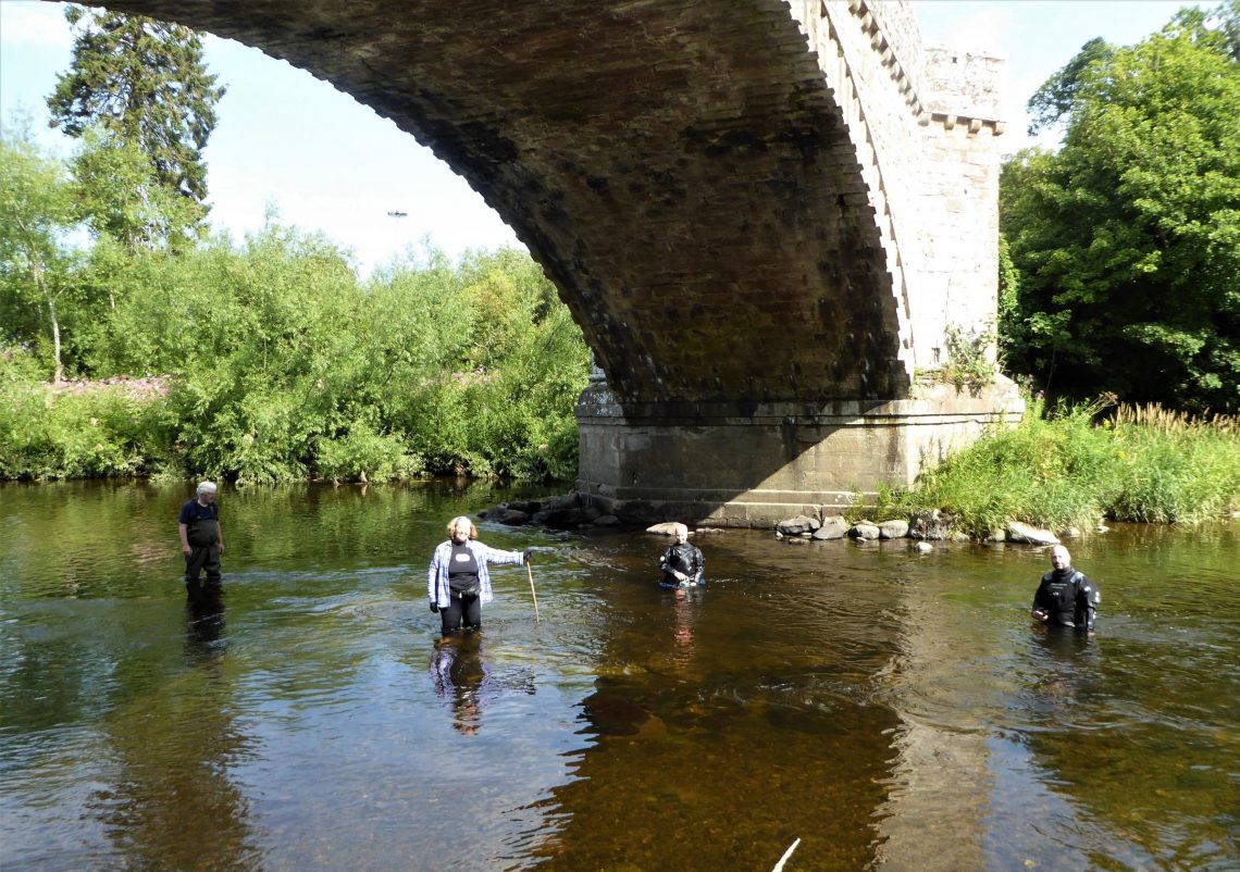 Archaeologists discover remains of 14th century bridge on riverbed
