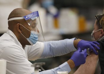 Getting a first COVID-19 vaccine shot can boost mental health, survey says